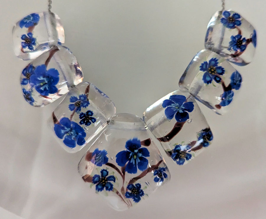 Blue flower beads made to fit together as a 